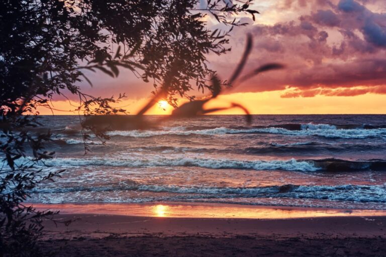 Beach waves at sunset